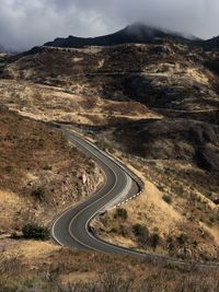 High angle view of road amidst mountain against sky