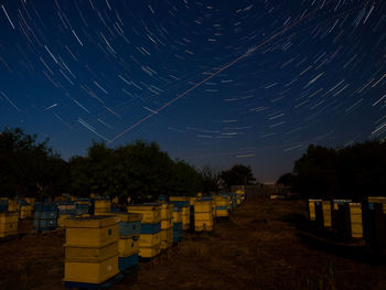 Scenic view of field against sky at night