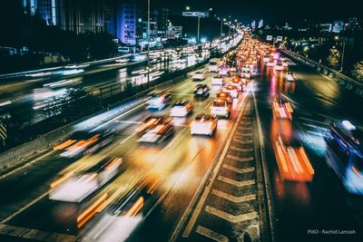 High angle view of traffic on city street at night