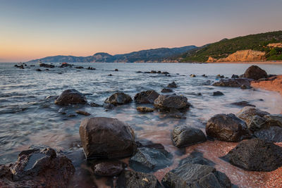 Scenic view of sea against sky during sunset