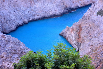 High angle view of rock formation in sea