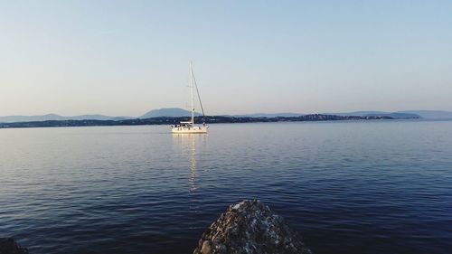 Boats sailing in sea