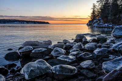 Scenic view of sea against sky during sunset