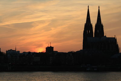 View of buildings against sky during sunset