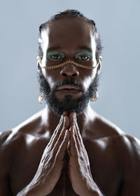 Portrait of young man wearing mask