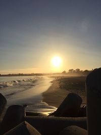 Scenic view of sea at sunset