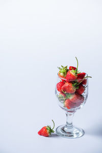 Close-up of strawberries against white background