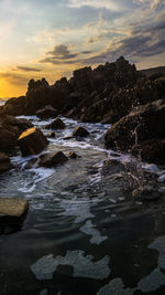 Scenic view of sea against sky during sunset