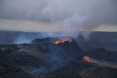 Smoke emitting from volcanic mountain