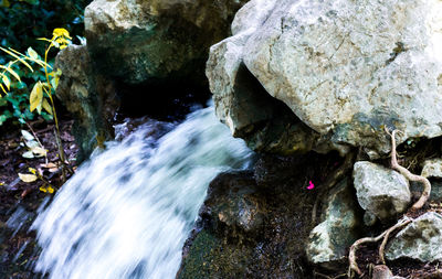 Close-up of water flowing through rocks