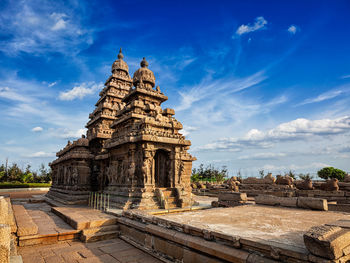 Old temple building against sky