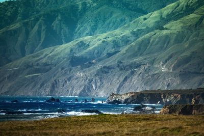 Scenic view of sea and mountains