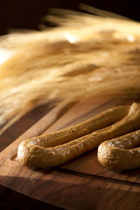 High angle view of bread on cutting board