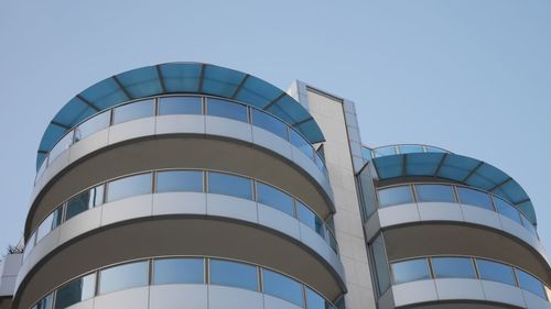 Low angle view of water tower against clear sky