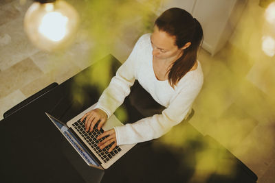 Young woman using mobile phone