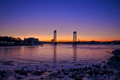 Scenic view of calm sea at sunset