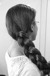 Woman with braided hair at home