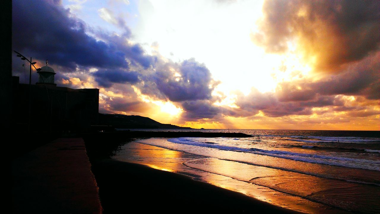 sunset, sea, sky, water, horizon over water, beach, cloud - sky, scenics, beauty in nature, tranquil scene, tranquility, shore, orange color, nature, idyllic, cloud, sun, cloudy, reflection, dramatic sky