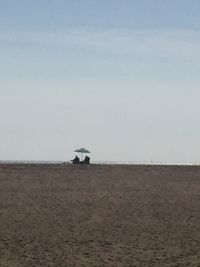 Scenic view of desert against sky