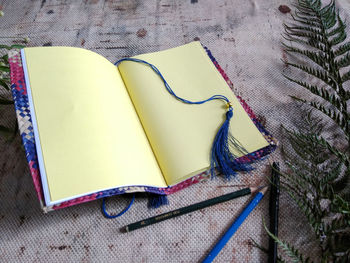 High angle view of books on table