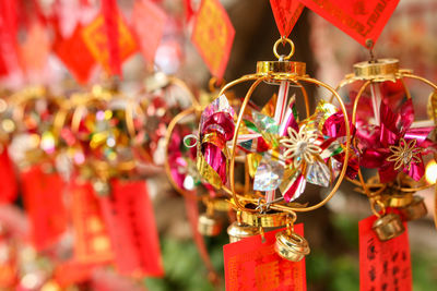 Close-up of decoration hanging for sale in market