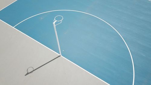 High angle view of basketball hoop against blue sky