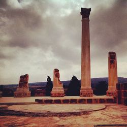 Monument against cloudy sky