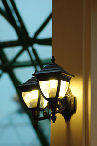 Low angle view of illuminated lamps