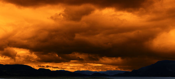 Scenic view of dramatic sky during sunset