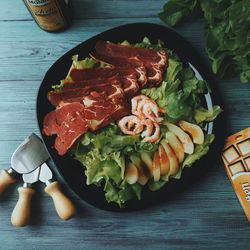High angle view of vegetables on cutting board