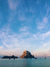 Scenic view of sea against blue sky