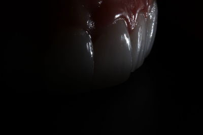 Close-up of water over black background