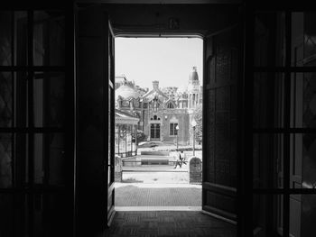 Buildings seen through doorway