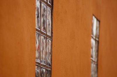 Full frame shot of orange wall of building