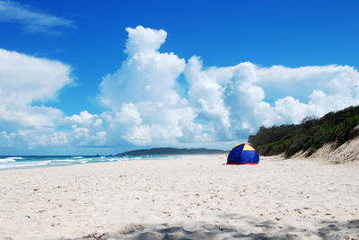 Scenic view of beach against sky