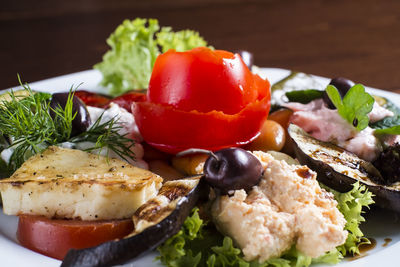 Close-up of burger in plate on table