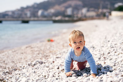 Portrait of cute boy on beach