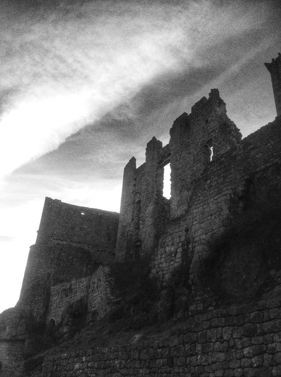 architecture, built structure, building exterior, low angle view, sky, old, history, old ruin, the past, ancient, damaged, ruined, castle, stone wall, abandoned, religion, cloud - sky, weathered, outdoors