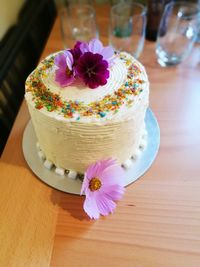 High angle view of birthday cake on cake