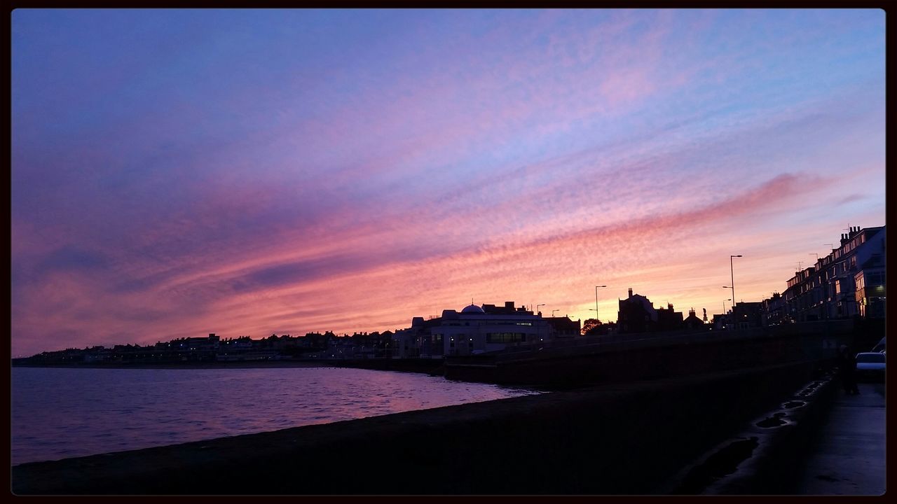 sunset, transfer print, sky, architecture, building exterior, built structure, auto post production filter, water, silhouette, cloud - sky, city, orange color, dusk, river, cloud, outdoors, nature, sea, transportation, scenics