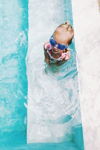 High angle view of girl in swimming pool