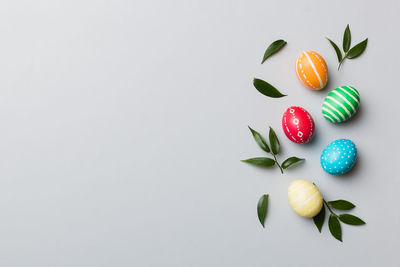 Directly above shot of christmas decorations on white background