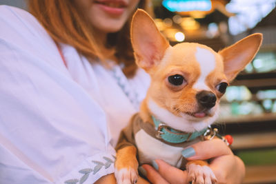 Portrait of woman with dog