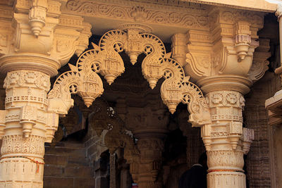 Low angle view of statues on historic building