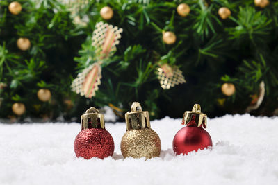 Close-up of christmas decoration on snow