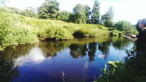 Reflection of trees in lake