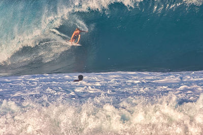 Man surfing in sea