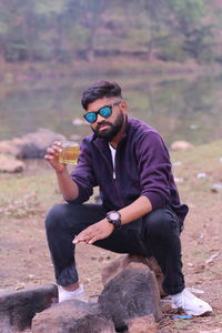 Indian male model drinking whiskey