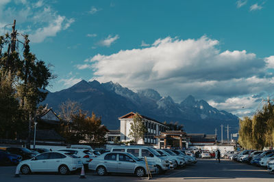 Buildings in city against sky