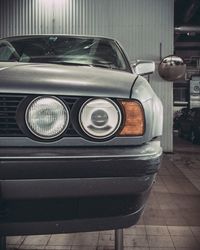 Close-up of vintage car on street